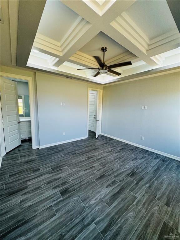 unfurnished bedroom featuring beamed ceiling, ceiling fan, ensuite bath, and coffered ceiling