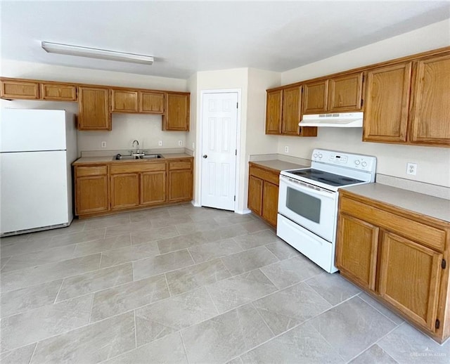 kitchen with white appliances and sink