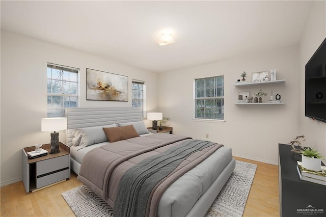 bedroom featuring light hardwood / wood-style floors