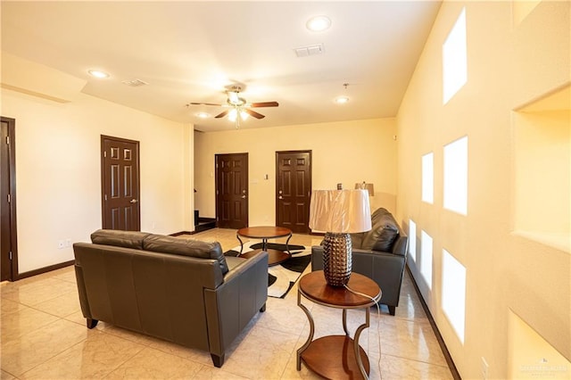 living room with ceiling fan