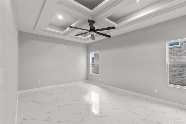 unfurnished room with ceiling fan, beam ceiling, and coffered ceiling