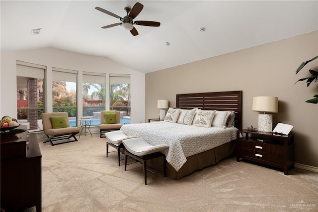 carpeted bedroom featuring ceiling fan and lofted ceiling