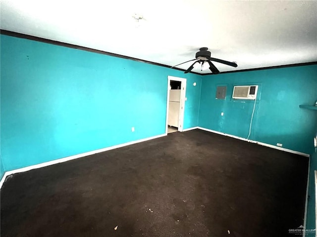 empty room with ornamental molding, an AC wall unit, ceiling fan, and baseboards