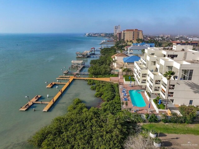 birds eye view of property with a water view