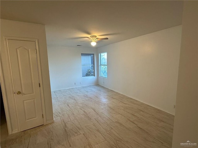 3518 Monette St, Edinburg, TX 78539 - spare room featuring ceiling fan and baseboards