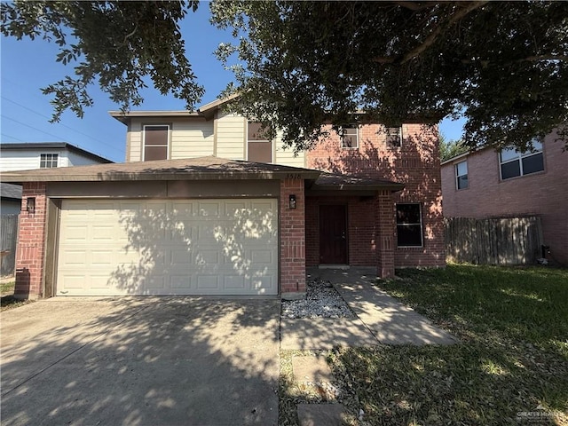 3518 Monette St, Edinburg, TX 78539 - traditional home featuring concrete driveway, brick siding, and an attached garage