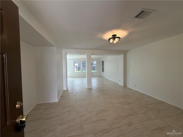 3518 Monette St, Edinburg, TX 78539 - empty room with baseboards and light marble finish flooring