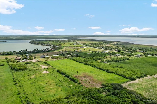 aerial view featuring a water view and a rural view