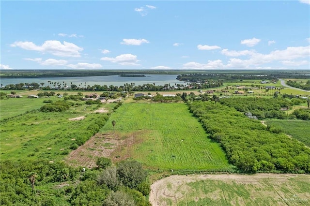 bird's eye view featuring a rural view and a water view