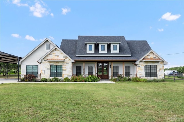 view of front of house featuring french doors, a carport, and a front lawn