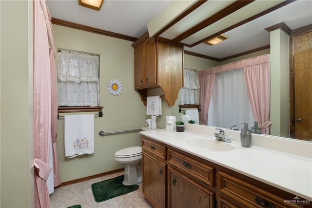 7226 Ford St, Mission, TX 78572 - bathroom featuring crown molding, vanity, toilet, baseboards, and tile patterned floors