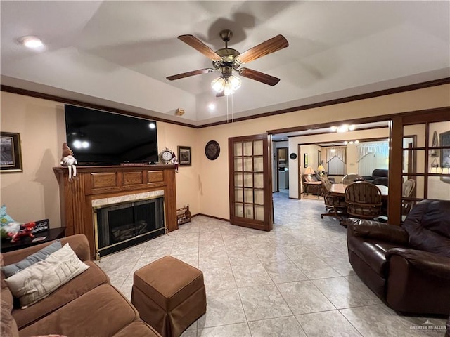 7226 Ford St, Mission, TX 78572 - living room with ceiling fan, french doors, a fireplace, light tile patterned floors, and baseboards