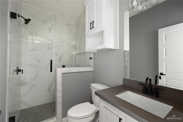 full bath with toilet, a shower stall, and vanity