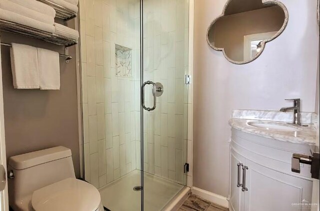 102 E Tarpon St, South Padre Island, TX 78597 - full bathroom with a shower stall and vanity