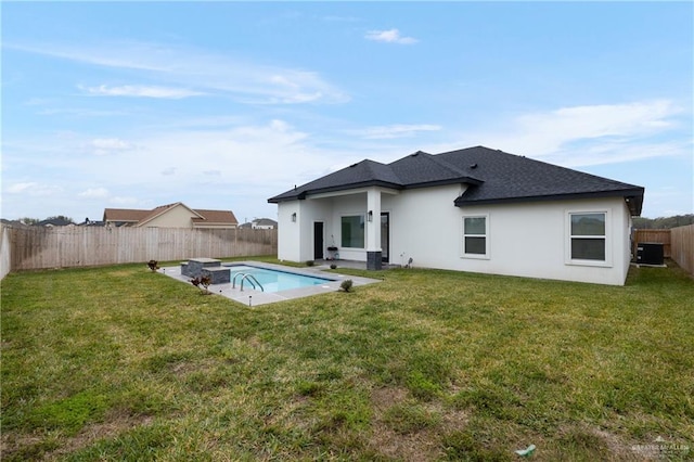 3100 Silver Oak Ave, Mission, TX 78574 - back of house featuring stucco siding, a shingled roof, and a fenced backyard