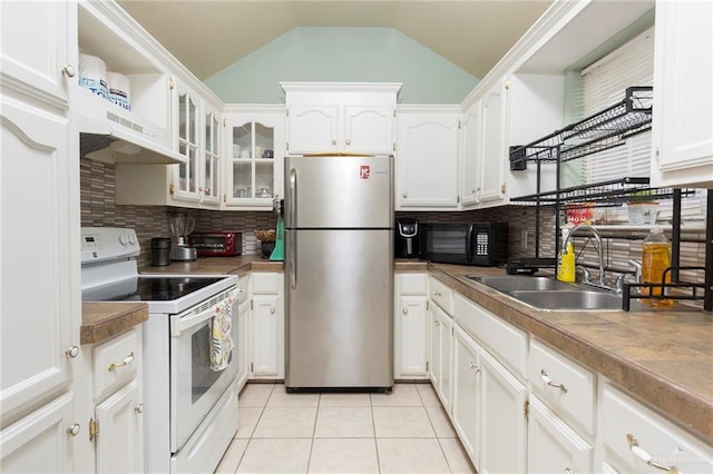 kitchen with lofted ceiling, white electric range, sink, stainless steel refrigerator, and white cabinets