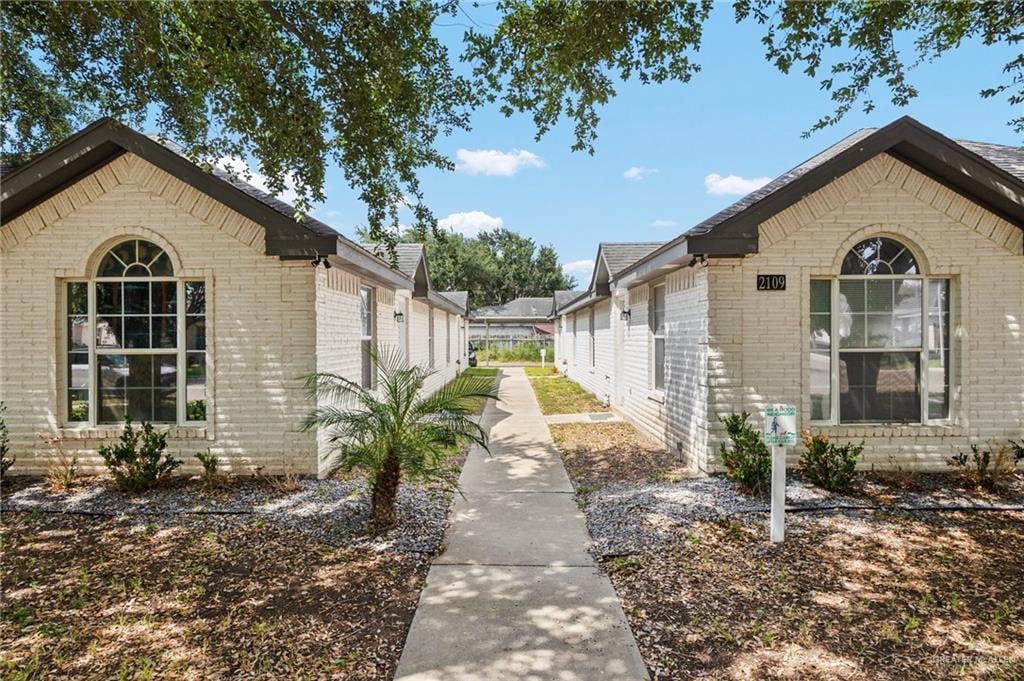 2109 Carlos Dr, Edinburg, TX 78541 - view of home's exterior featuring brick siding