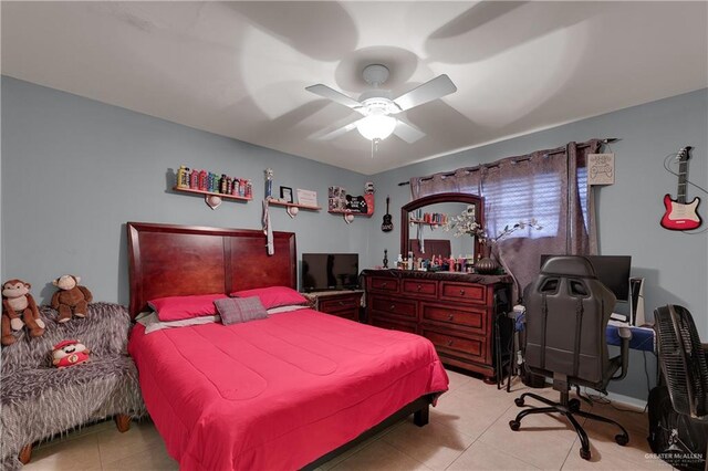 bedroom with light tile patterned floors and ceiling fan