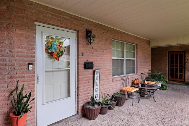 property entrance featuring covered porch