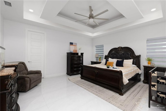 1213 N Garden Ridge Ave, San Juan, TX 78589 - bedroom featuring a tray ceiling, ceiling fan, baseboards, and recessed lighting