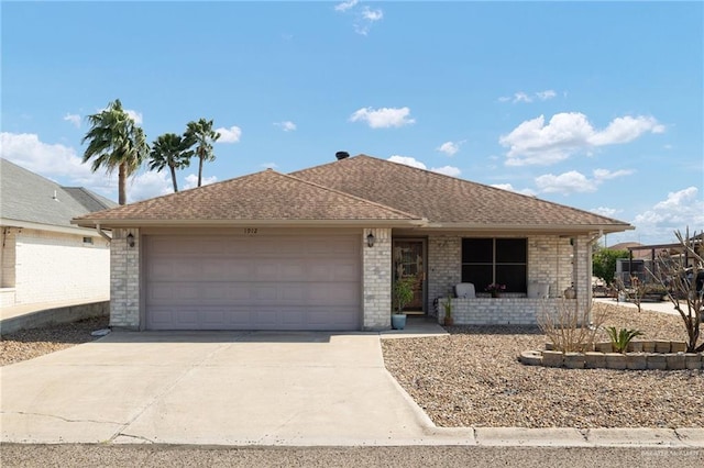 ranch-style home with a garage