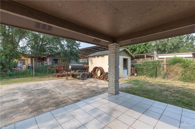 view of patio / terrace featuring an outdoor structure