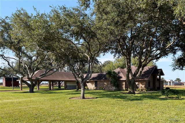 ranch-style house with a front lawn