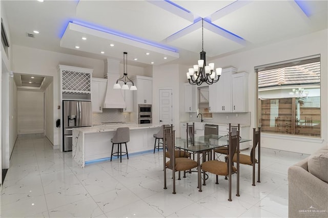 dining room with a chandelier, recessed lighting, visible vents, baseboards, and marble finish floor