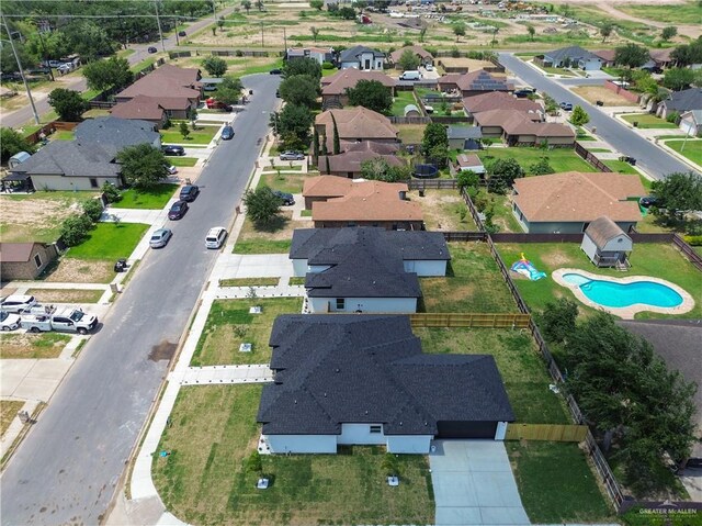 1506 N Rockport St, Alton, TX 78573 - aerial view of property's location featuring a pool area and nearby suburban area