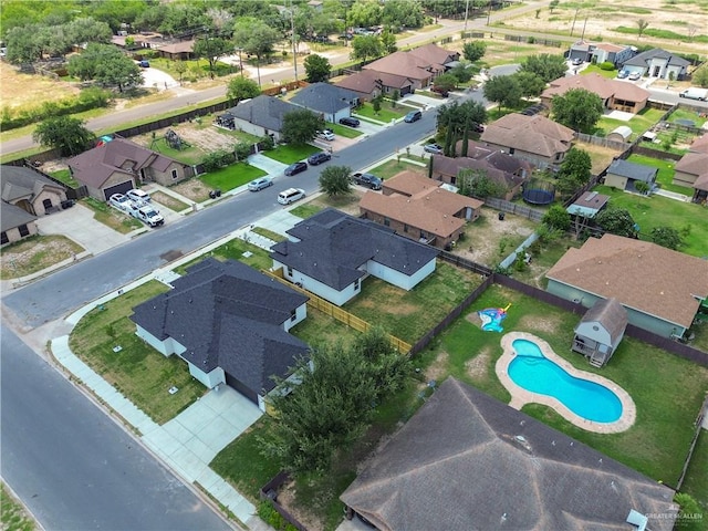 1506 N Rockport St, Alton, TX 78573 - aerial view of property's location featuring nearby suburban area and a pool area