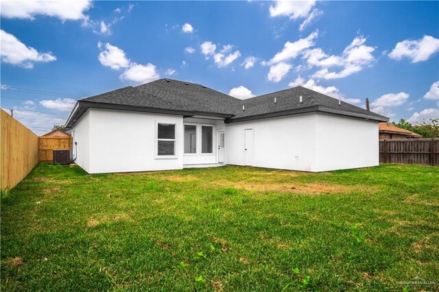 1506 N Rockport St, Alton, TX 78573 - back of property featuring central air condition unit, stucco siding, and a shingled roof