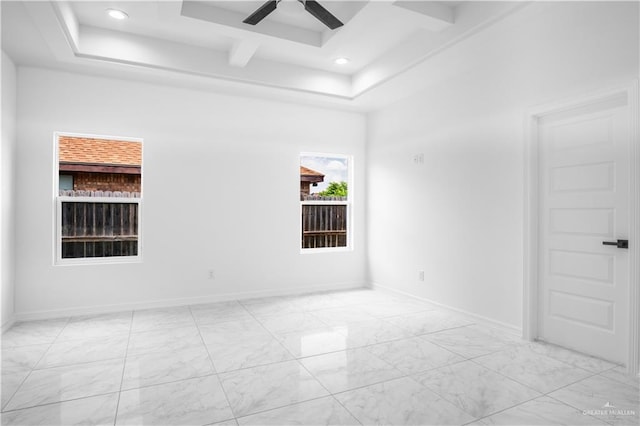 1506 N Rockport St, Alton, TX 78573 - unfurnished room featuring a tray ceiling, a ceiling fan, light marble finish floors, and baseboards