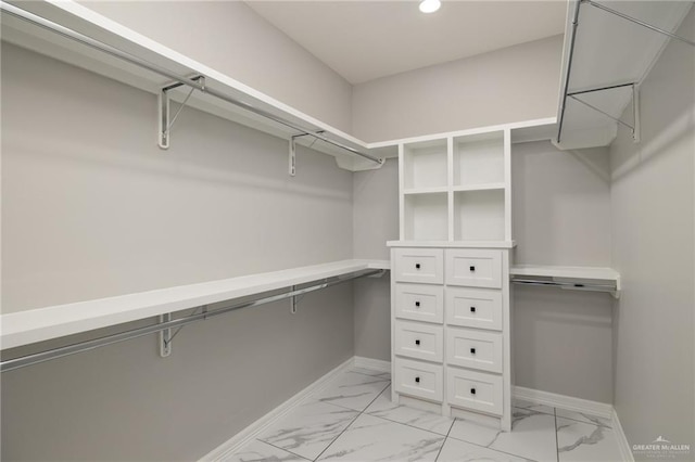 1606 Arden St, Mercedes, TX 78570 - walk in closet featuring light marble finish flooring