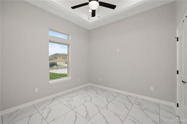 1606 Arden St, Mercedes, TX 78570 - spare room with light marble finish flooring, a ceiling fan, and baseboards