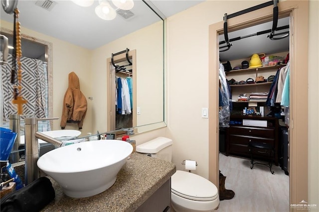 bathroom with sink and toilet