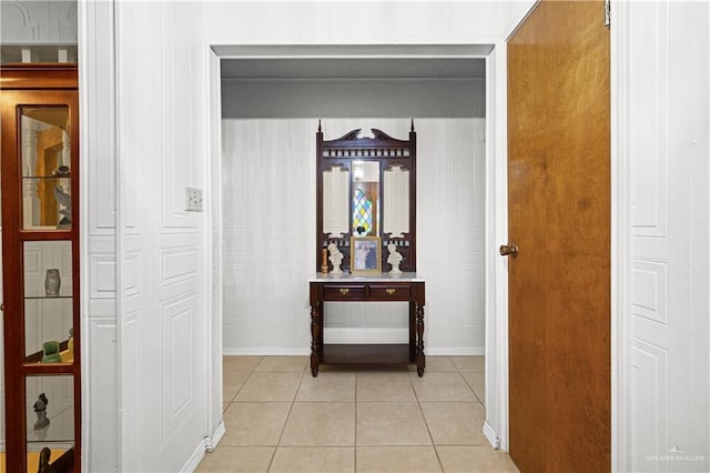 hallway with light tile patterned floors