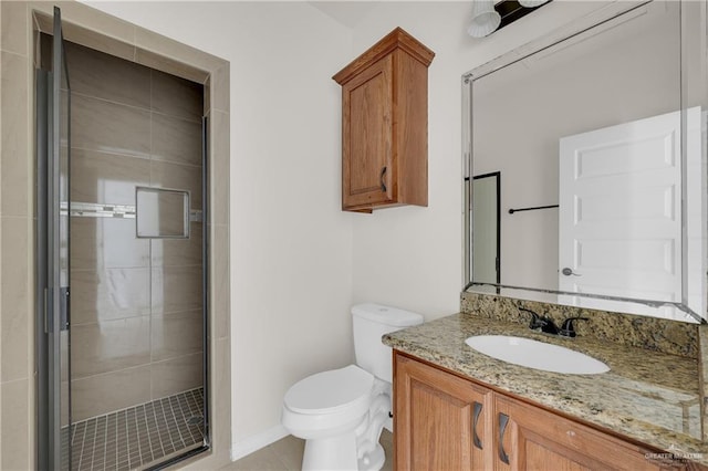 bathroom with walk in shower, vanity, and toilet