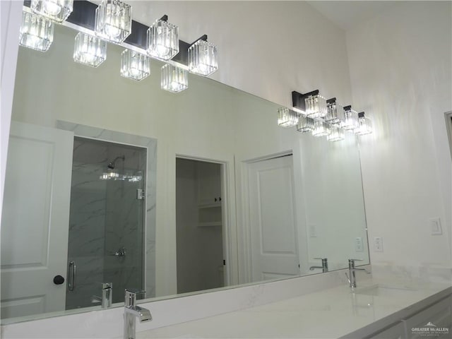 3309 S Marla Ct, Edinburg, TX 78542 - full bath featuring a marble finish shower and vanity