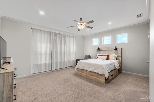 carpeted bedroom with baseboards, ornamental molding, and visible vents
