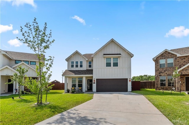 modern farmhouse style home featuring an attached garage, fence, driveway, and a front yard