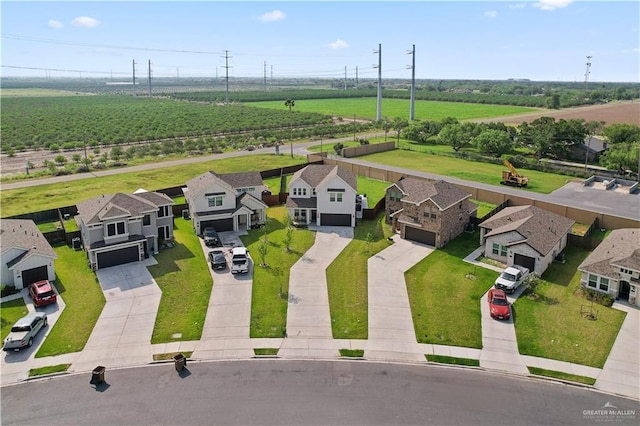 aerial view with a rural view and a residential view