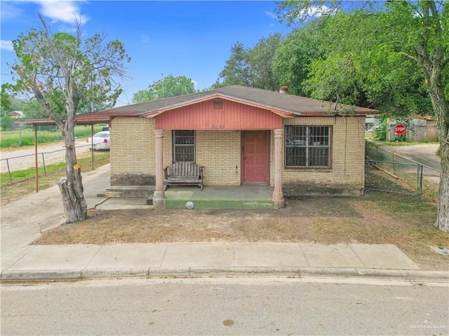 6653 El Camino Real, Mission, TX 78572 - view of front of property with fence and brick siding