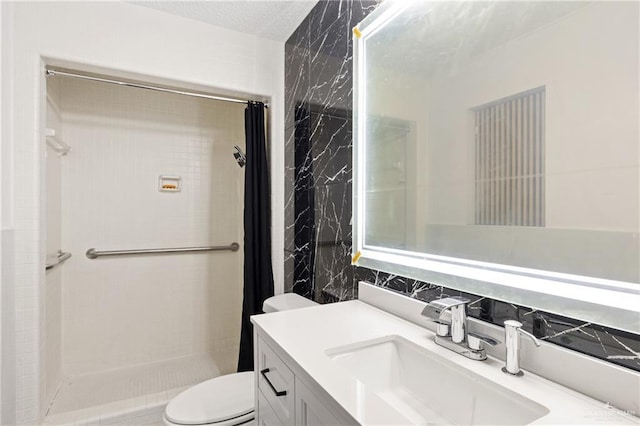 bathroom featuring decorative backsplash, vanity, toilet, and walk in shower