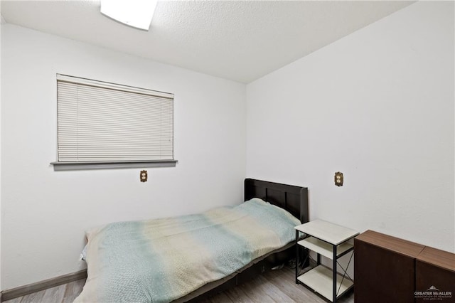 bedroom featuring light hardwood / wood-style floors