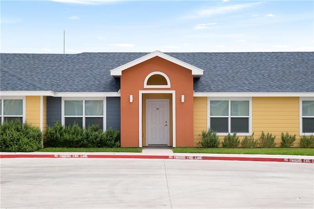 1500 Westgate Dr, Weslaco, TX 78596 - view of front of home featuring a shingled roof