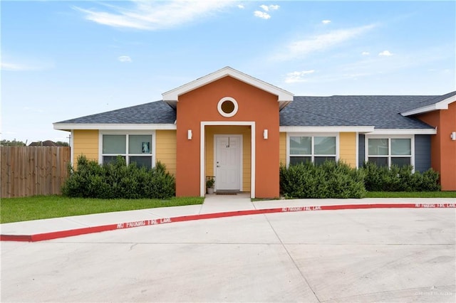 1500 Westgate Dr, Weslaco, TX 78596 - view of front facade featuring a shingled roof