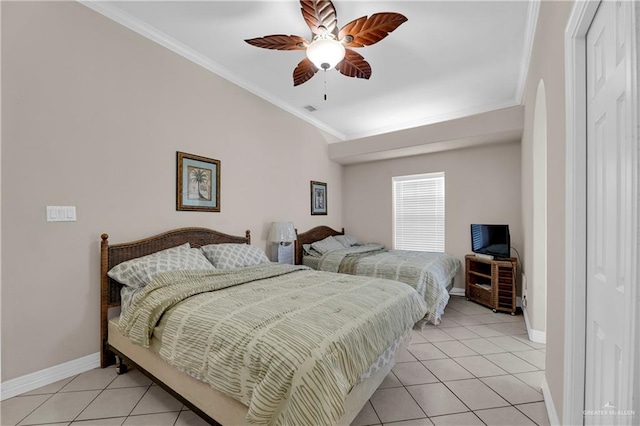 bedroom with ceiling fan, crown molding, and light tile patterned floors