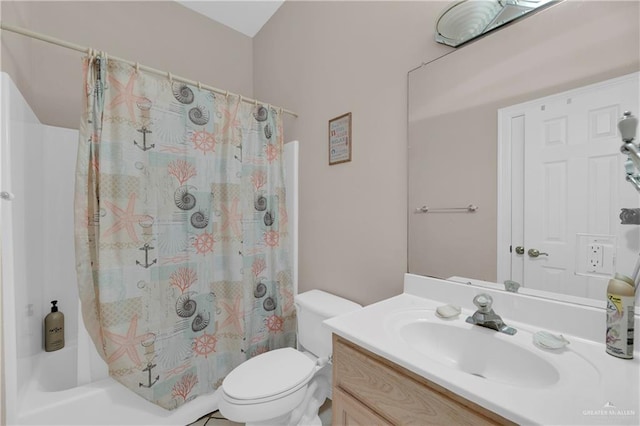 full bathroom featuring vanity, toilet, and shower / bathtub combination with curtain