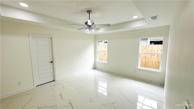 spare room featuring ceiling fan