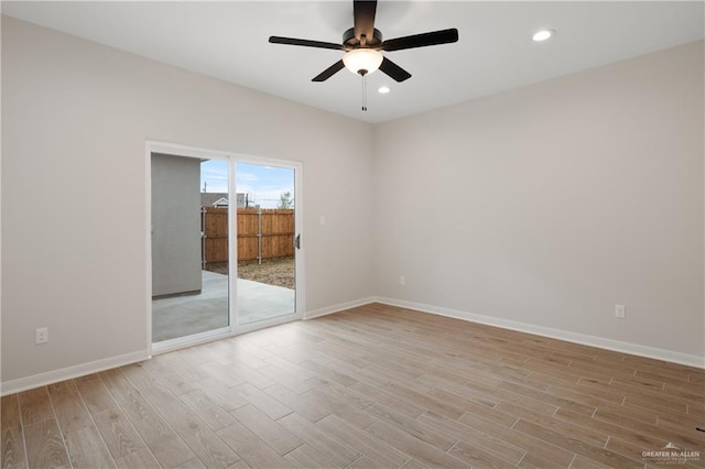 unfurnished room with light hardwood / wood-style floors and ceiling fan